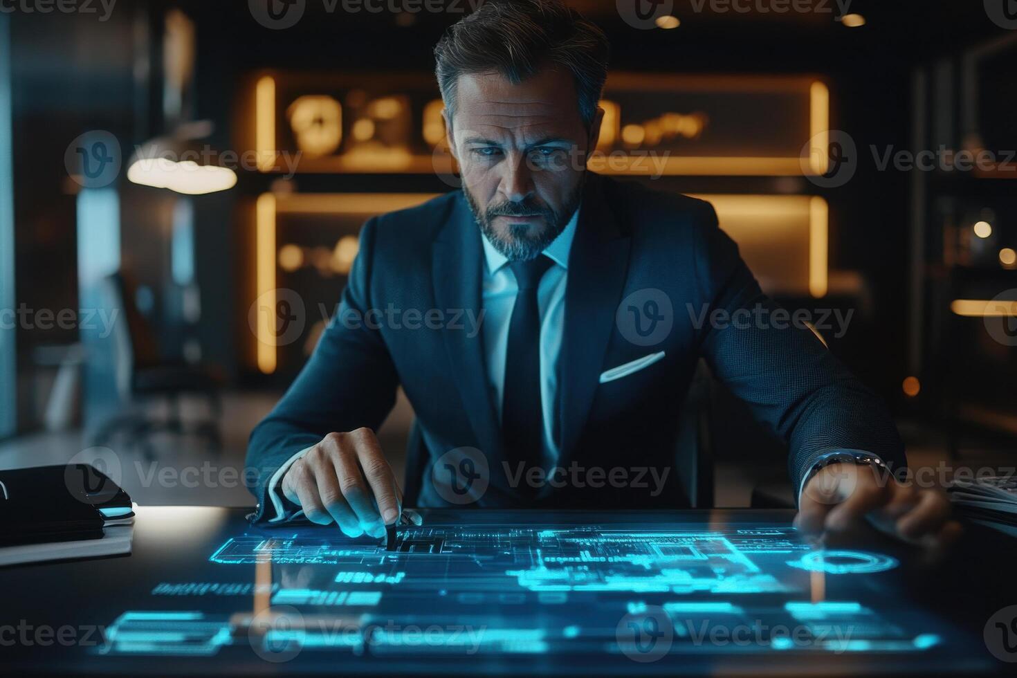 Male leader at a sleek desk interacting with a holographic display photo