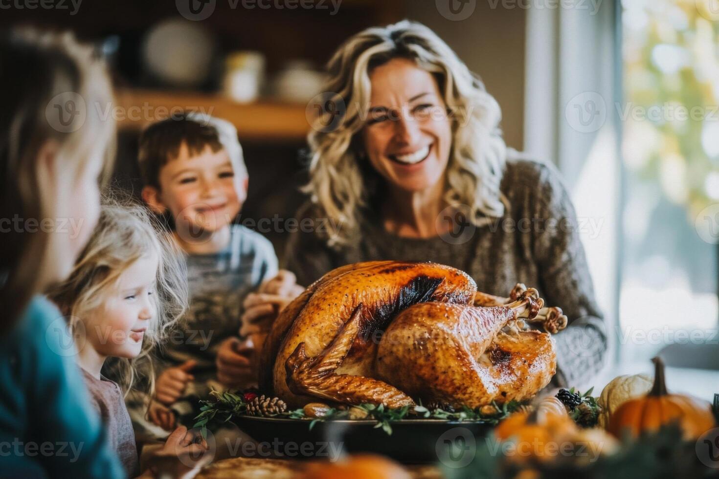 Family gathered around a roasted turkey for Thanksgiving dinner. photo
