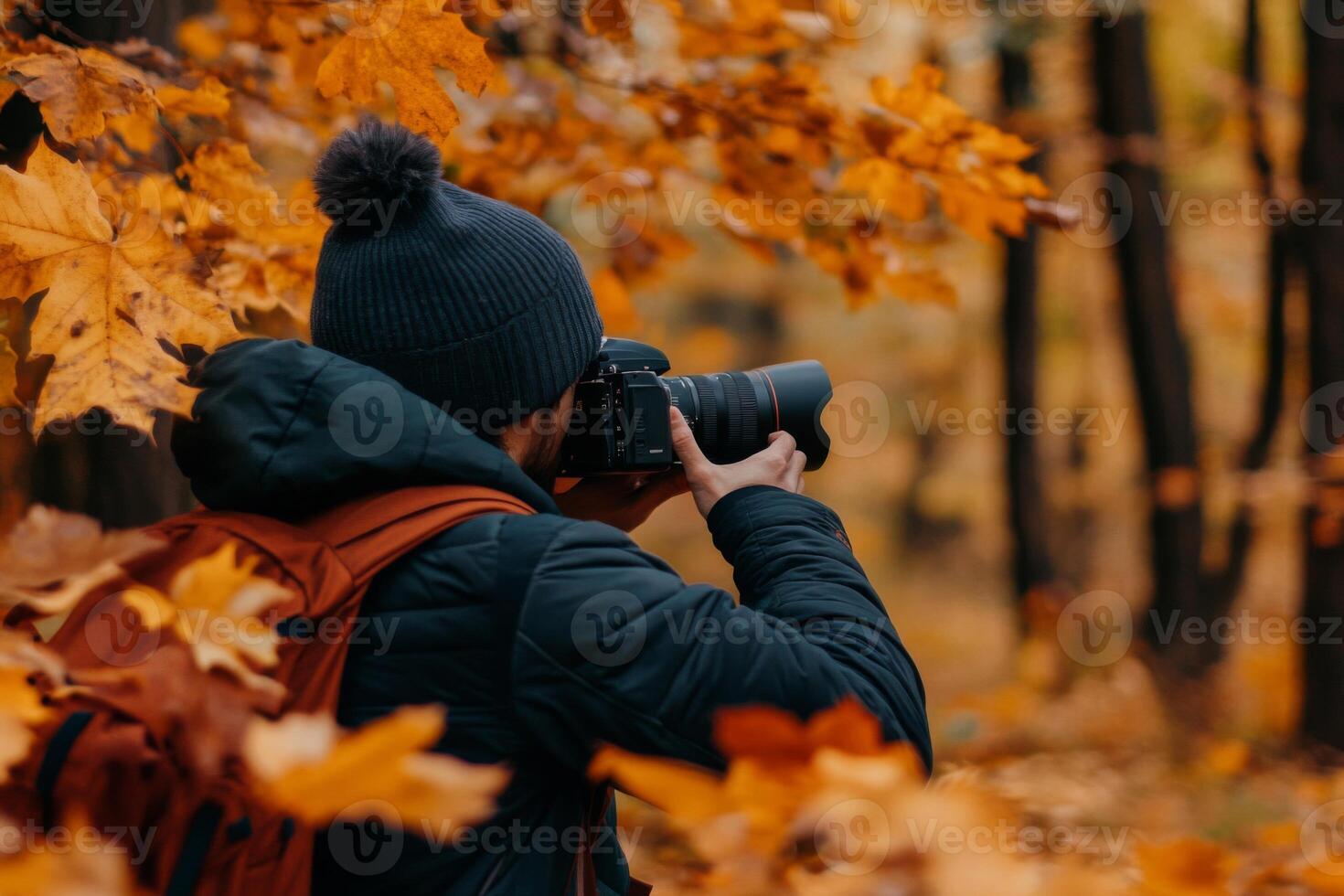 Man in a Forest Taking a Photo with a Camera