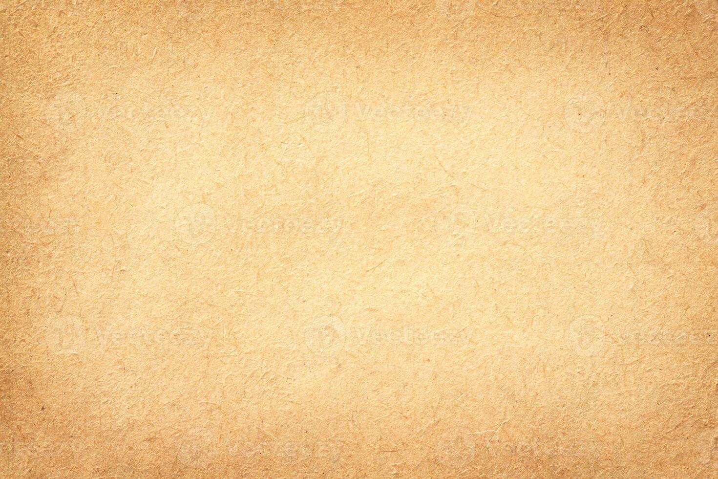 yellowed paper texture background. weathered manuscript as wallpaper photo