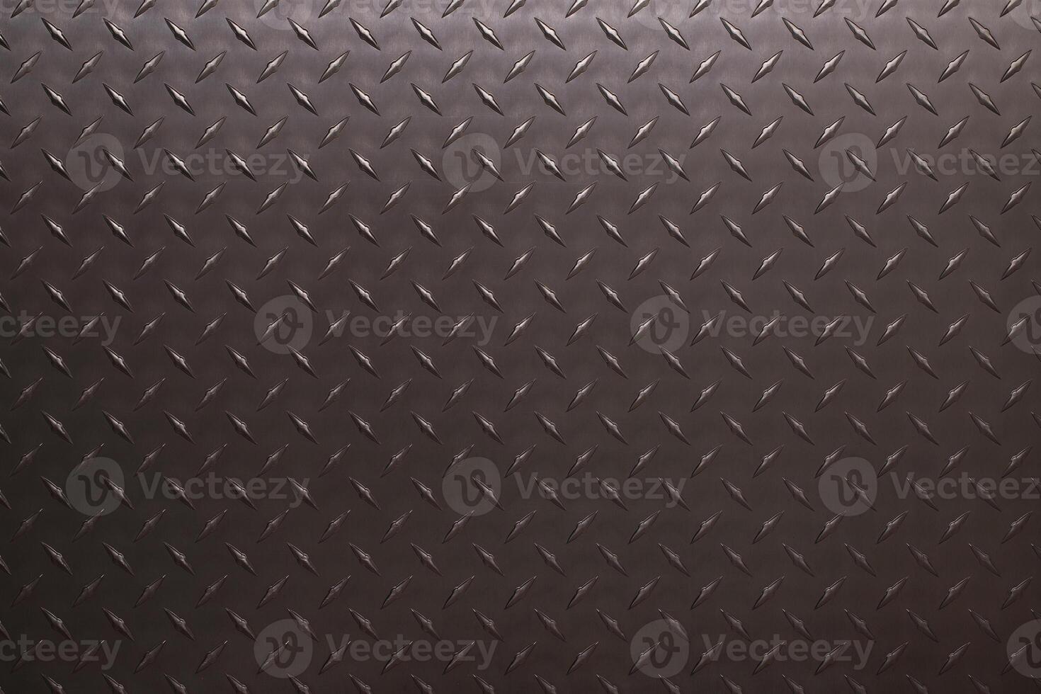 dark metal texture with rhombus pattern, iron sheet as background photo