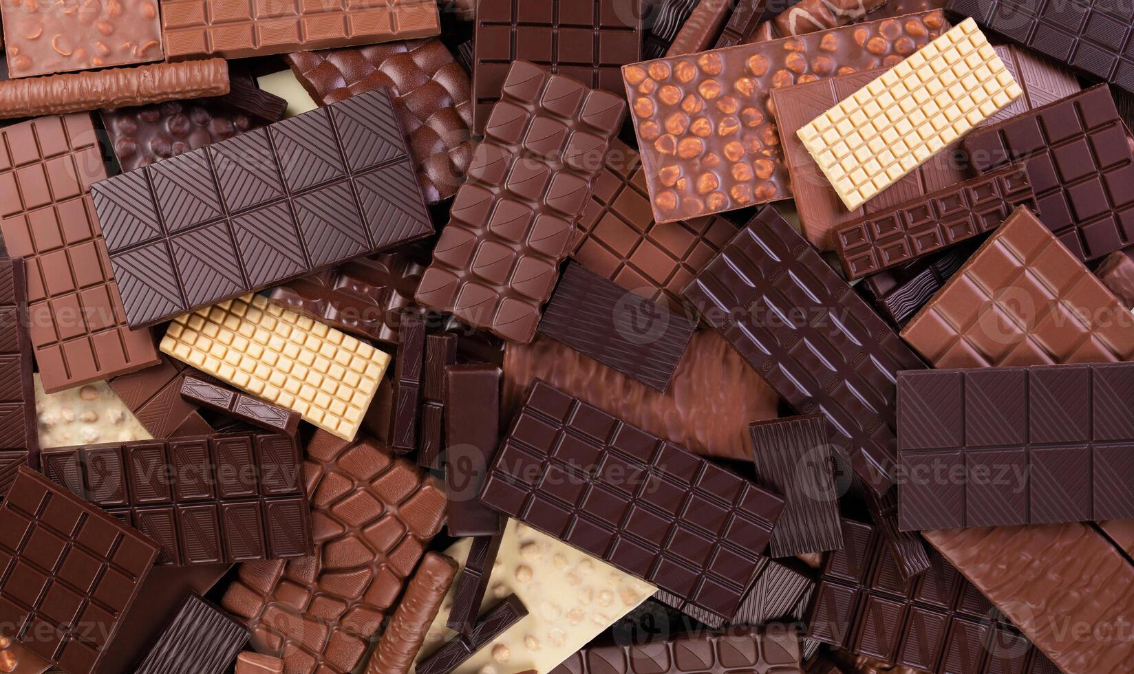 heap chocolate bar as a food background, confectionery cocoa product photo
