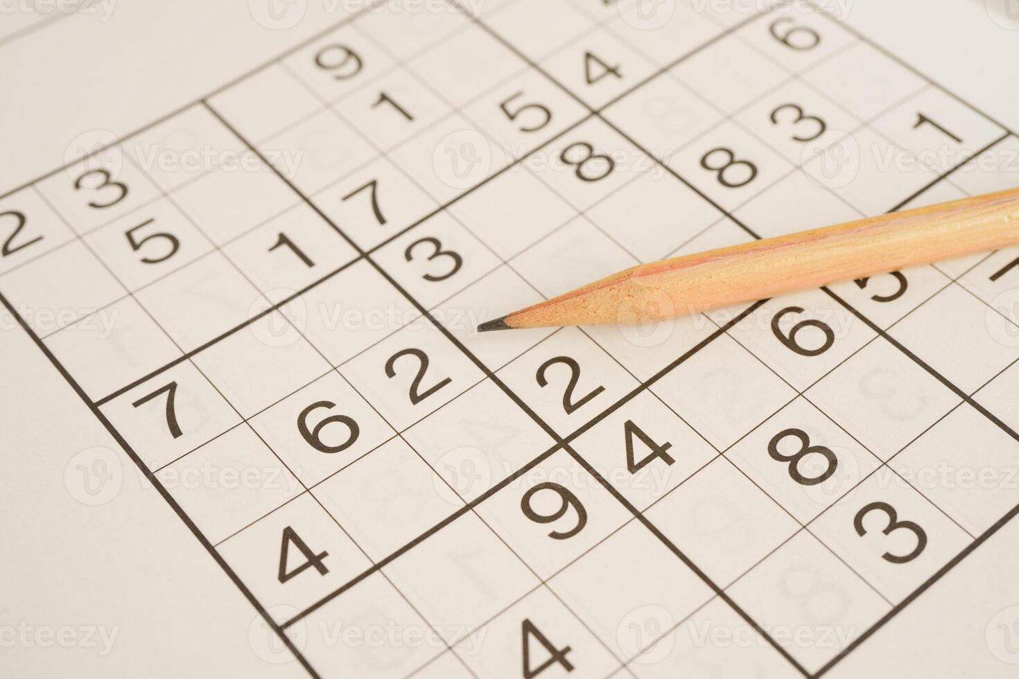 Sudoku puzzle, game to play for keep you brain younger for developing Alzheimer disease in senior patient. photo