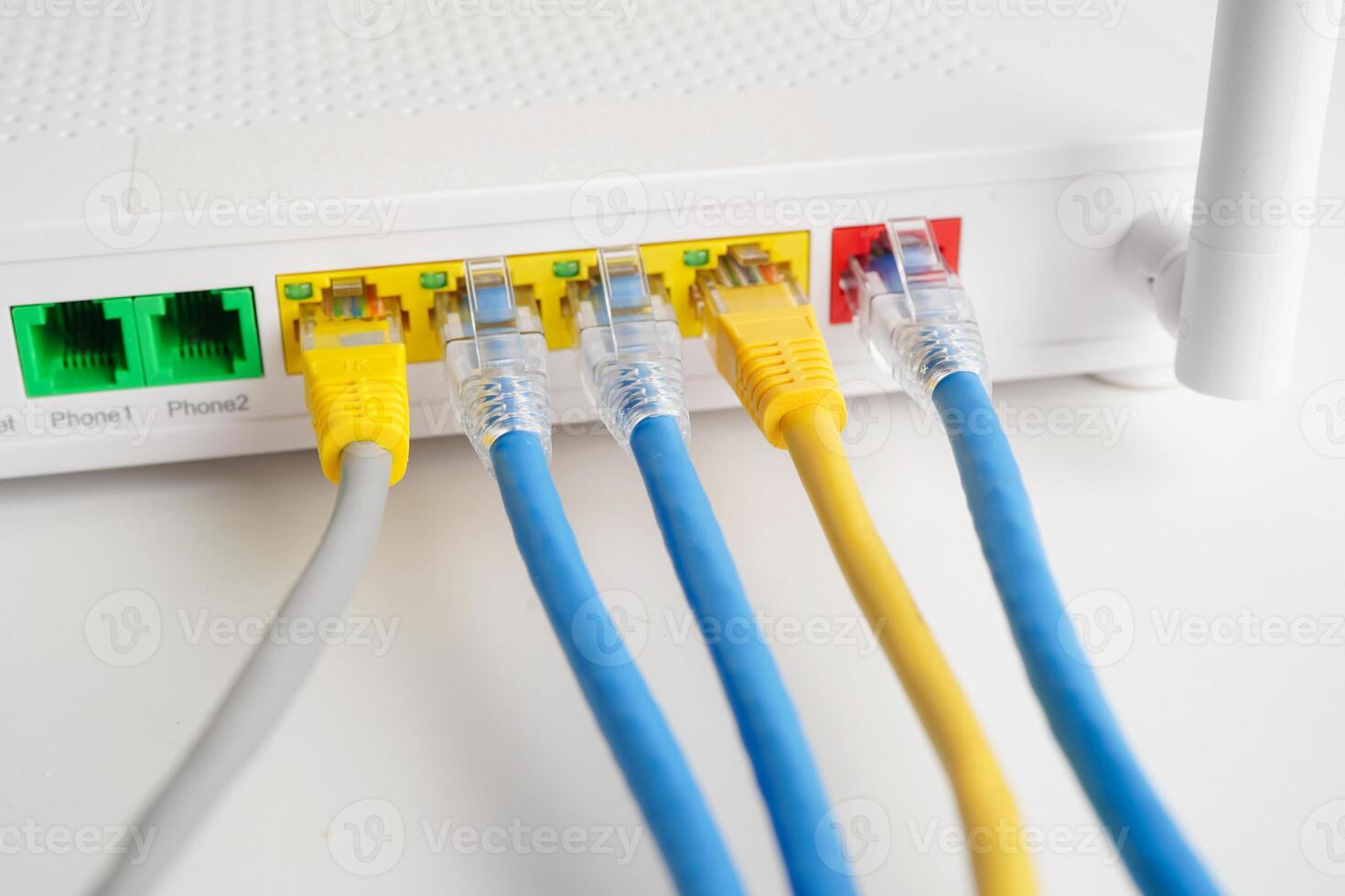 Ethernet cable with wireless router connect to internet service provider network. photo