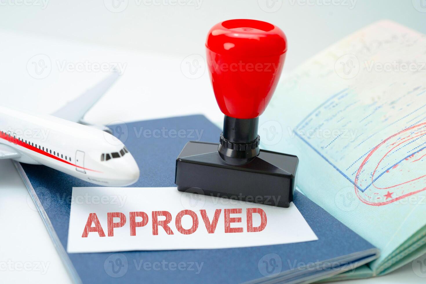 Passport with approved stamp on document for tourism to immigration at airport in country. photo