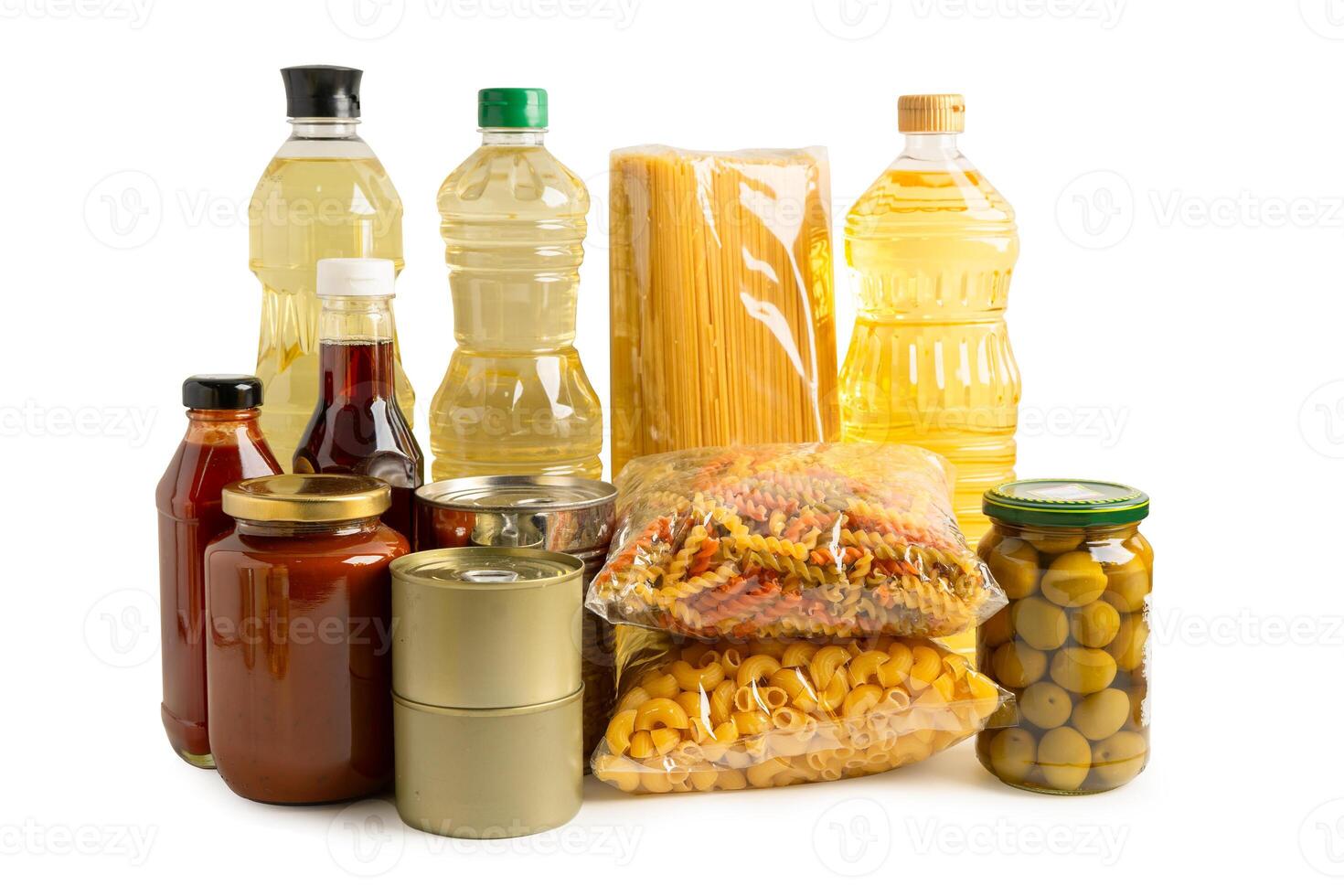 Foodstuff for donation isolated on white background with clipping path, storage and delivery. Various food, pasta, cooking oil and canned food. photo
