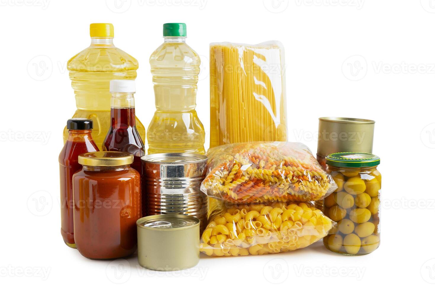 Foodstuff for donation isolated on white background with clipping path, storage and delivery. Various food, pasta, cooking oil and canned food. photo