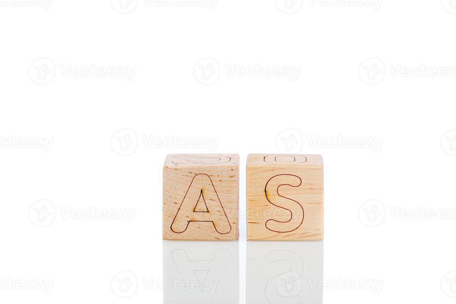 Wooden cubes with letters as on a white background photo