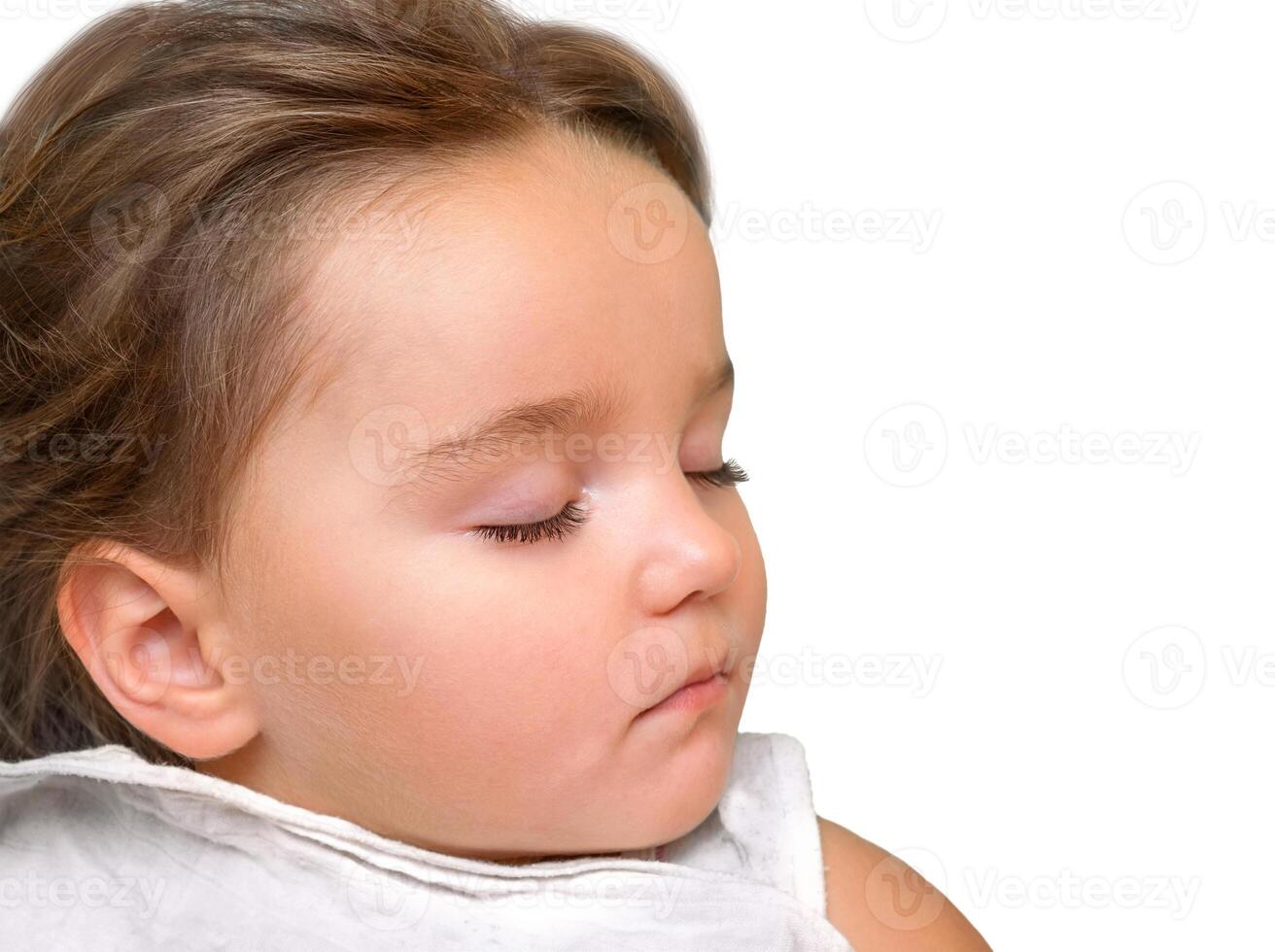 Baby sleeps sweetly isolated photo
