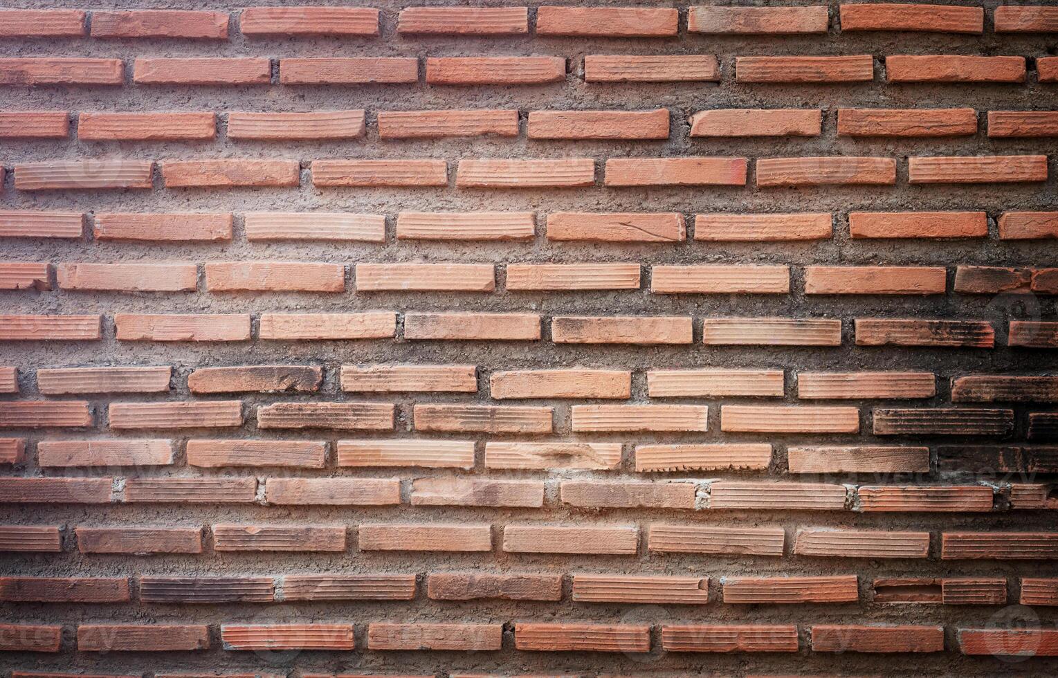 Red brick wall surface. photo