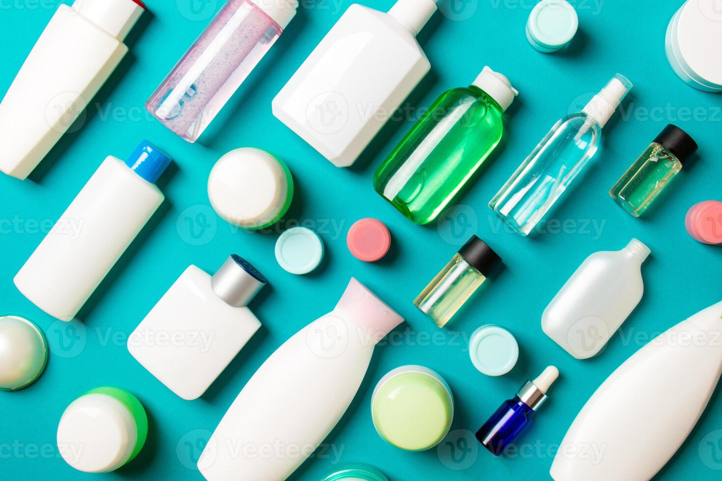 Group of plastic bodycare bottle Flat lay composition with cosmetic products on colored background empty space for you design. Set of White Cosmetic containers, top view with copy space photo