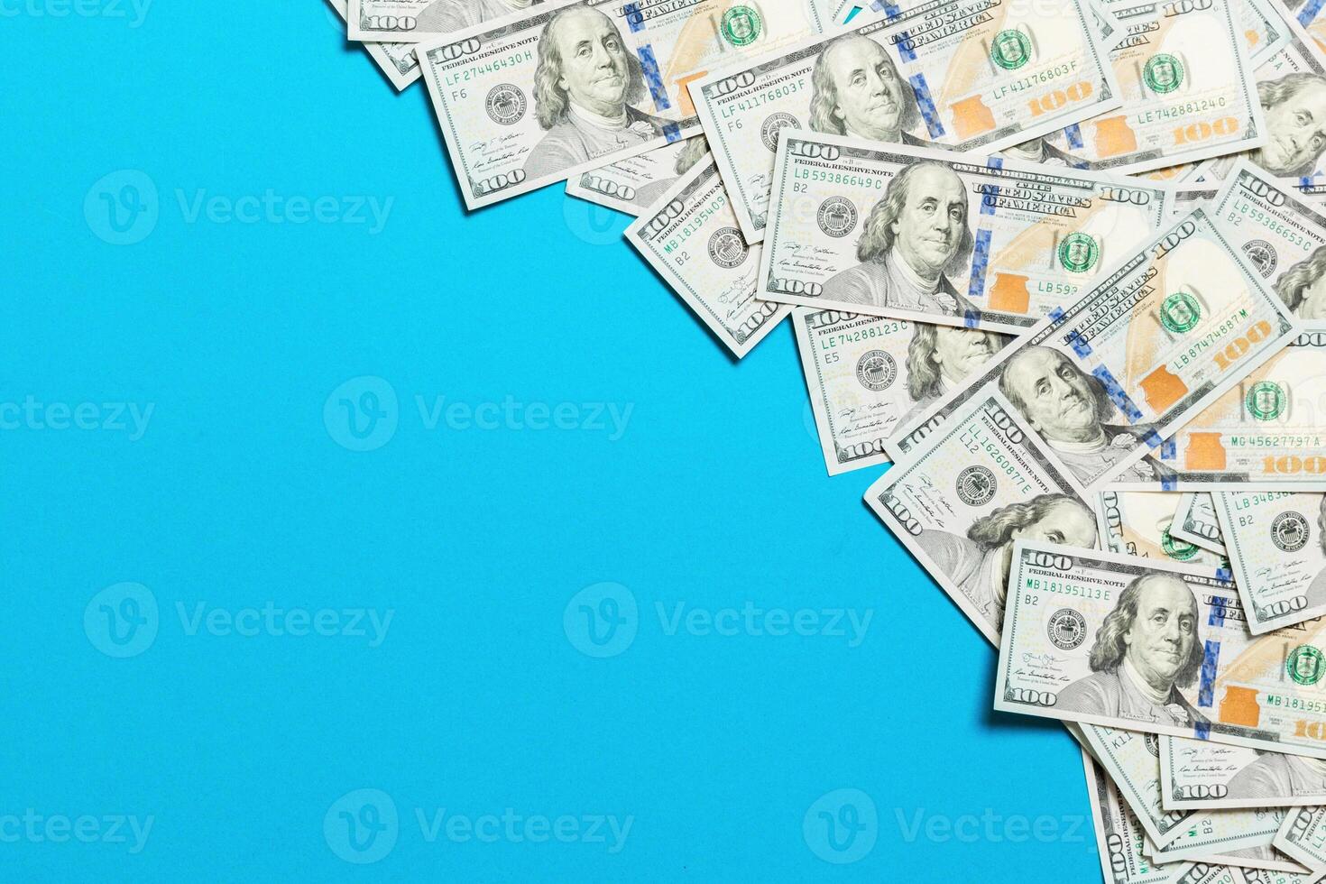 dollar bills a on a light colored background. copy space, top view business concept photo