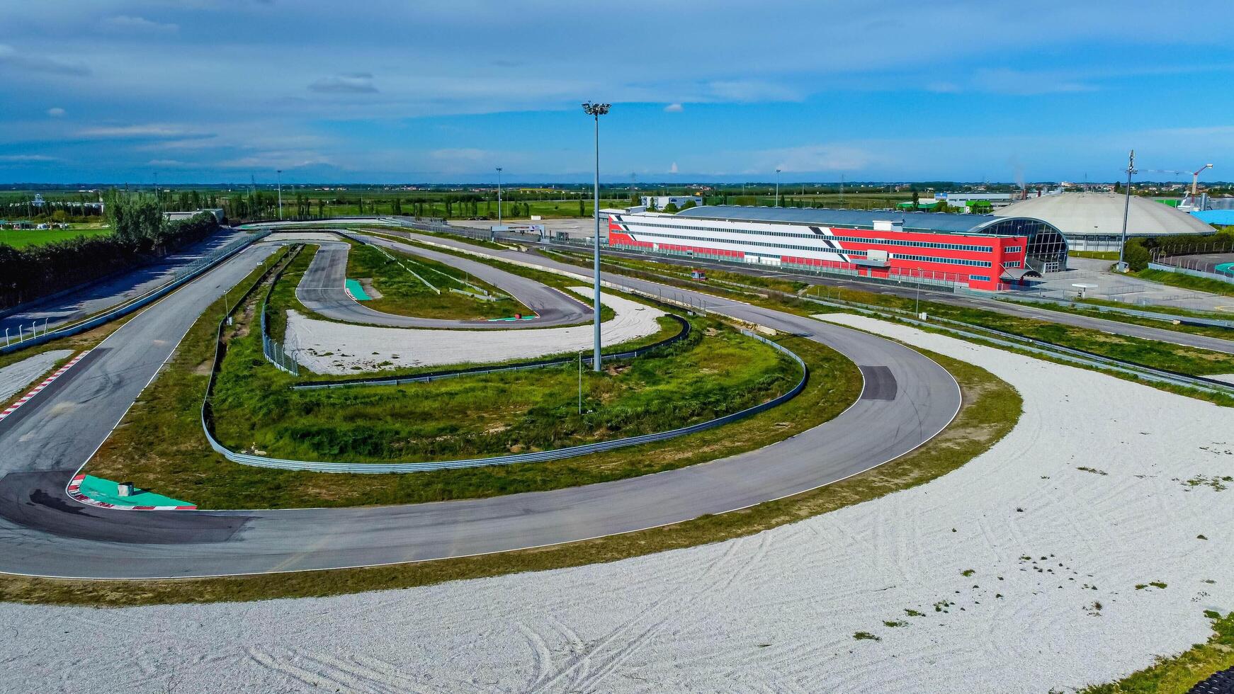 Adria racing circuit in Italy. Track abandoned for a few years where many cars and motorbikes raced. Current topic aerial view. photo