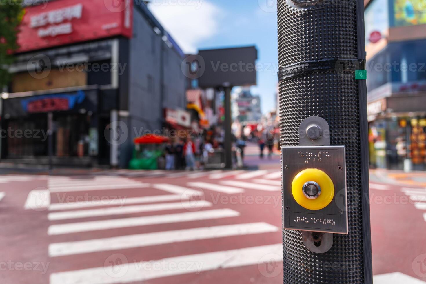 Yellow traffic light button , Crosswalk button for pedestrian with Braille photo