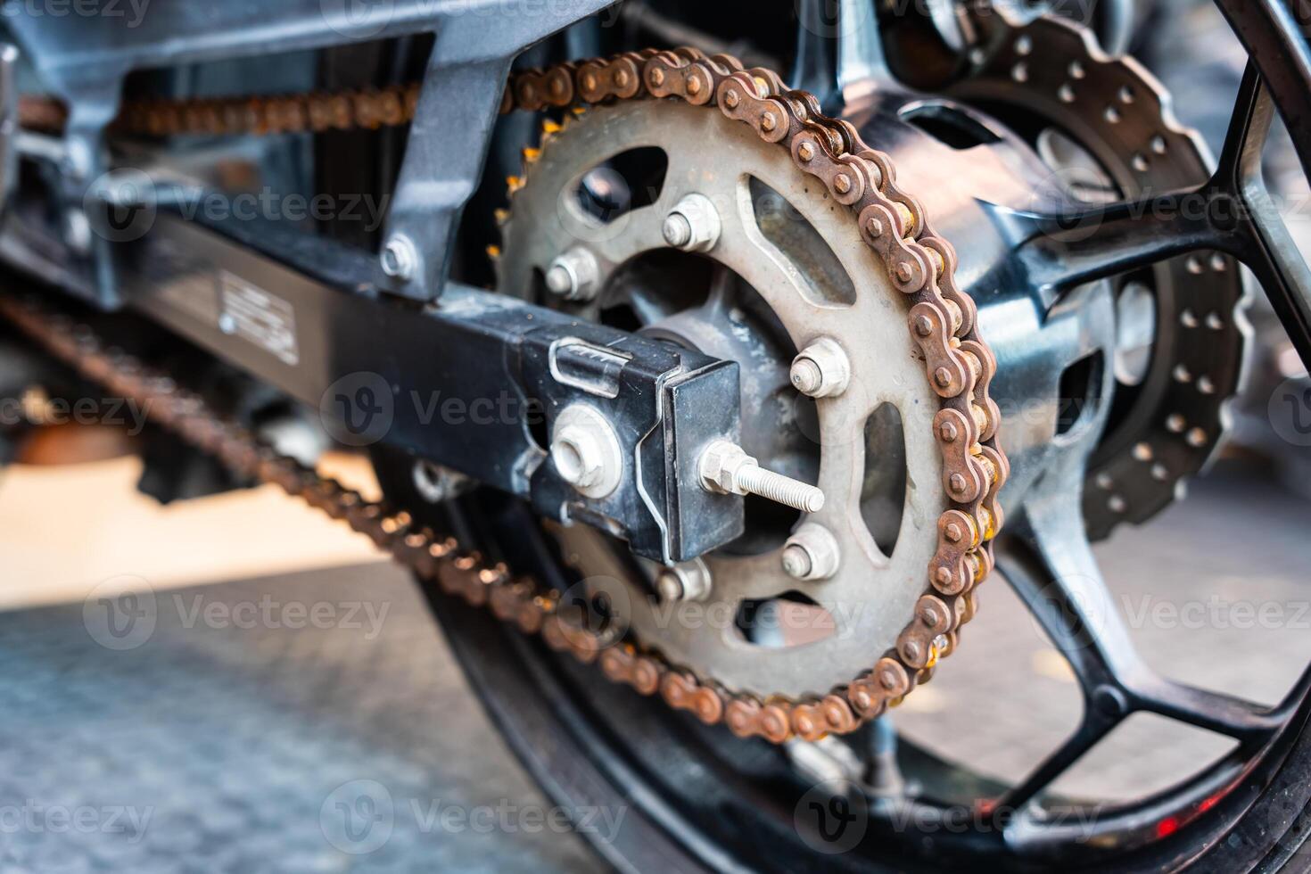 orange rust patches on motorcycle chain, Maintenance and repair motorcycle concept photo