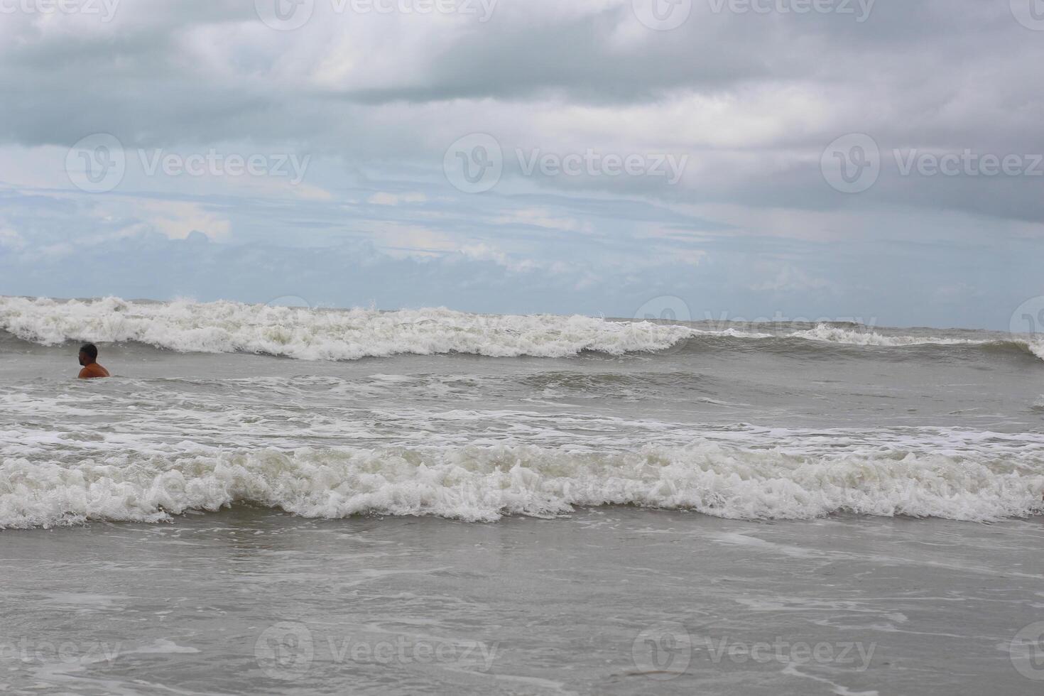 bad weather waves of a sea storm. summer landscape with sea, sky, waves and sand. view of the blue sea and the horizon. photo
