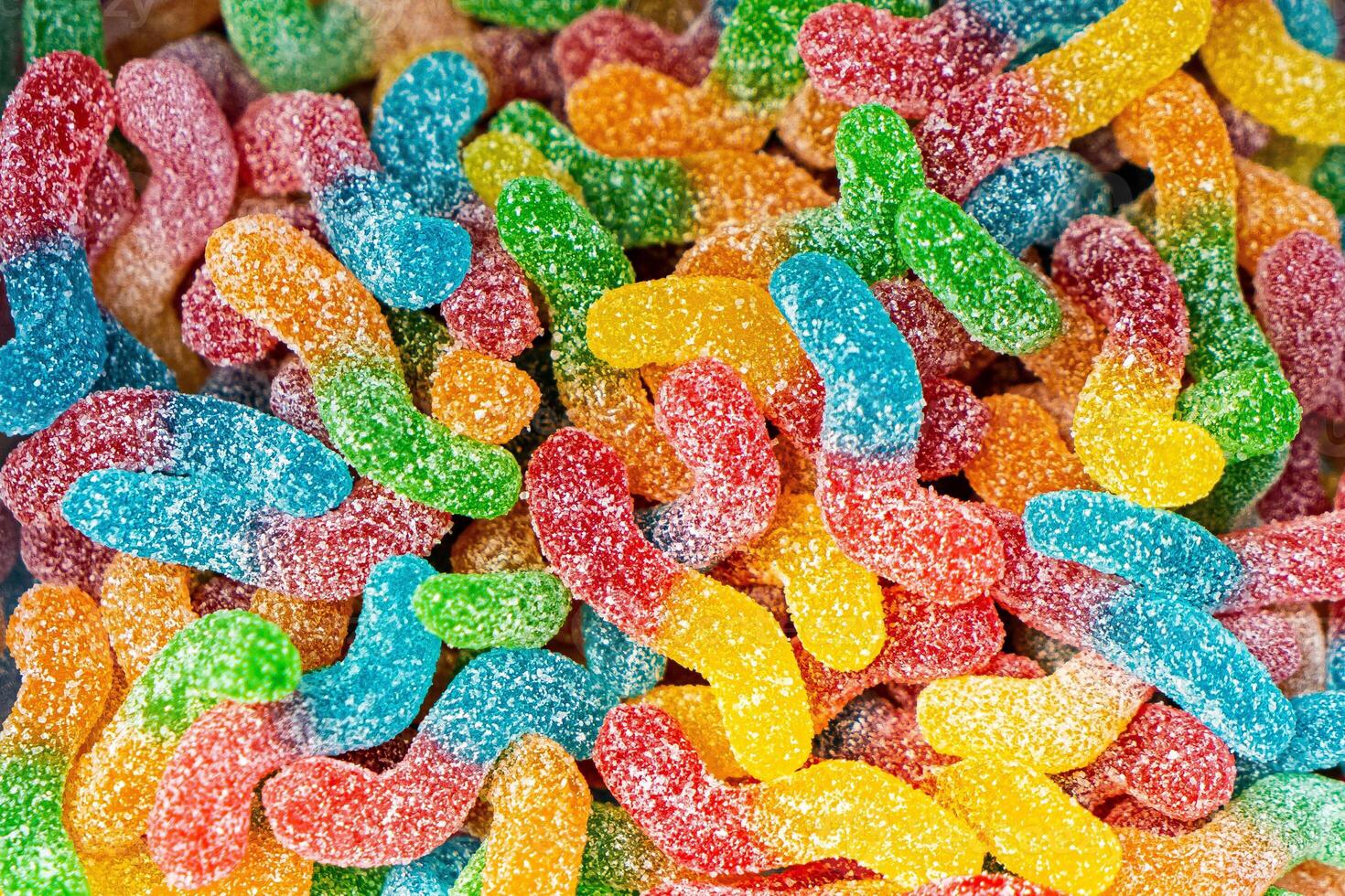 Assorted colorful gummy jelly candies. Top view. Jelly sweets. photo