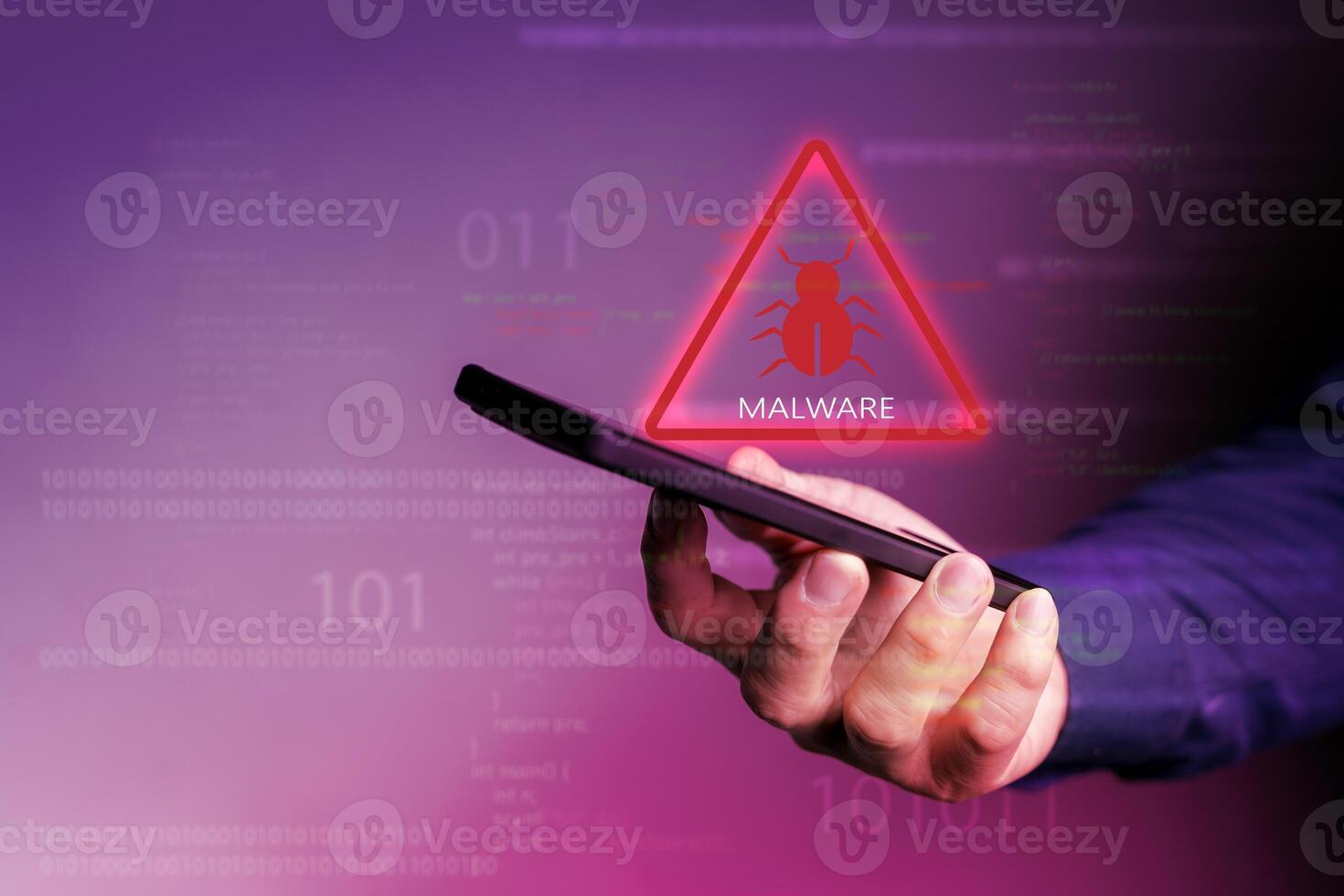 Hacker in hoodie dark theme Hacker in a blue hoody standing in front of a coding background photo