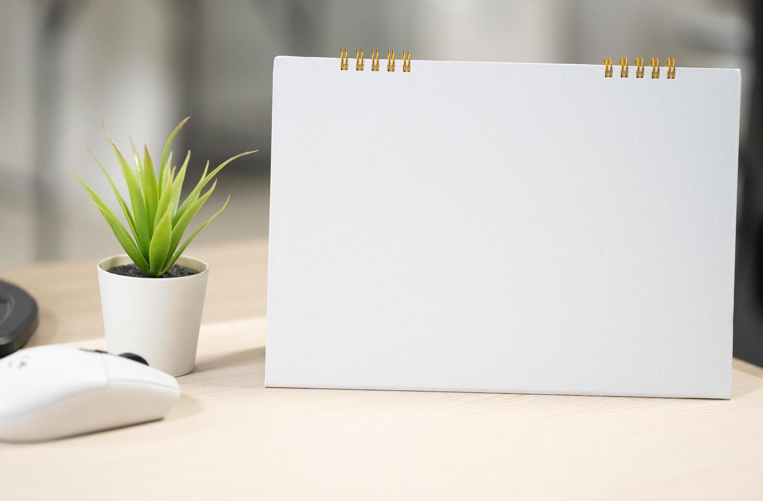 blank desk calendar at business office with copy space for text. photo