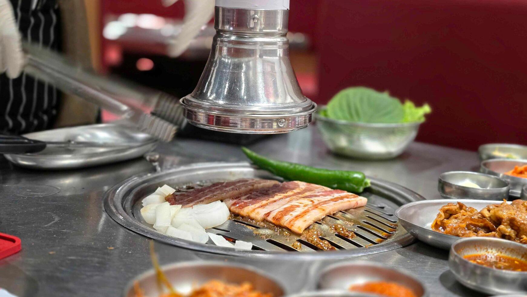 Premium pork marinated in a special sauce, grilled on Saemaeul's grill, A famous barbecue restaurant in South Korea. photo