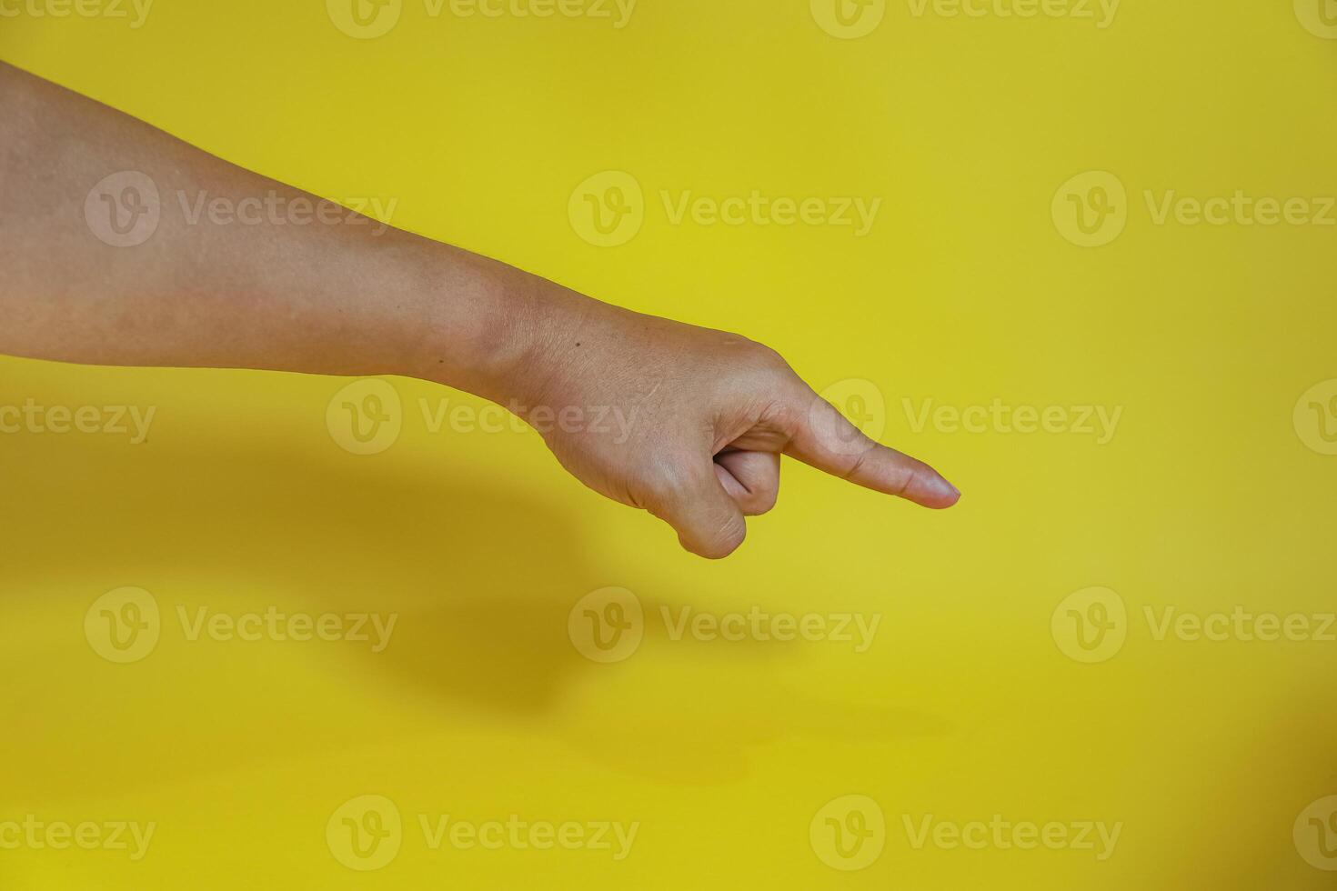 hand pointing on virtual object with index finger, making gesture photo