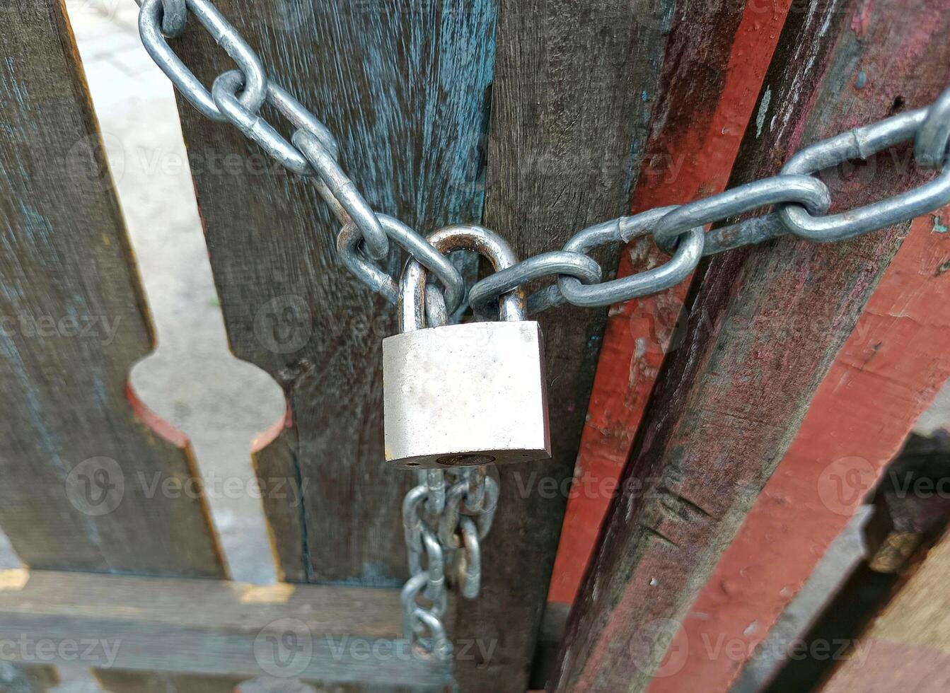 padlock used to lock a fence photo