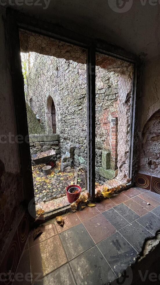 Old windows in the castle, view from the inside Poland photo