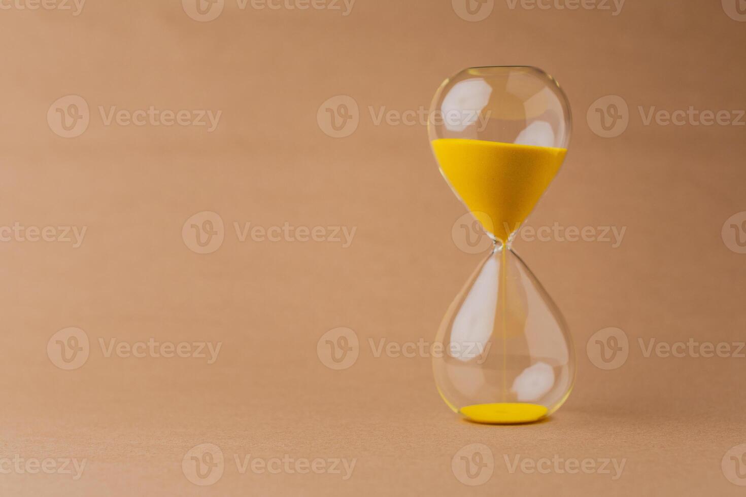 Hourglass Yellow Working with limited time The process of counting down time photo