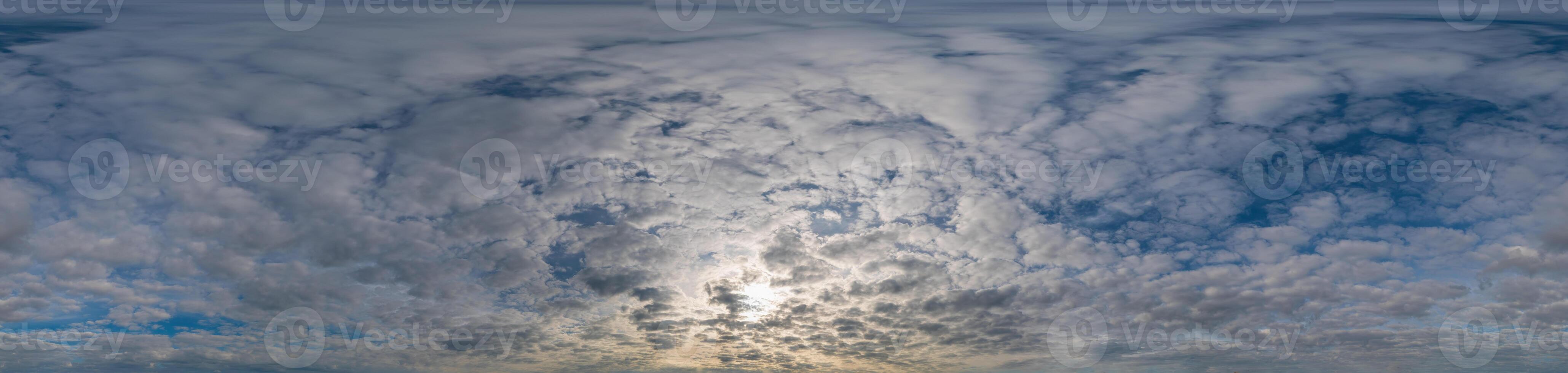 Sky panorama with Stratocumulus clouds in Seamless spherical equirectangular format. Full zenith for use in 3D graphics, game and editing aerial drone 360 degree panoramas for sky replacement. photo
