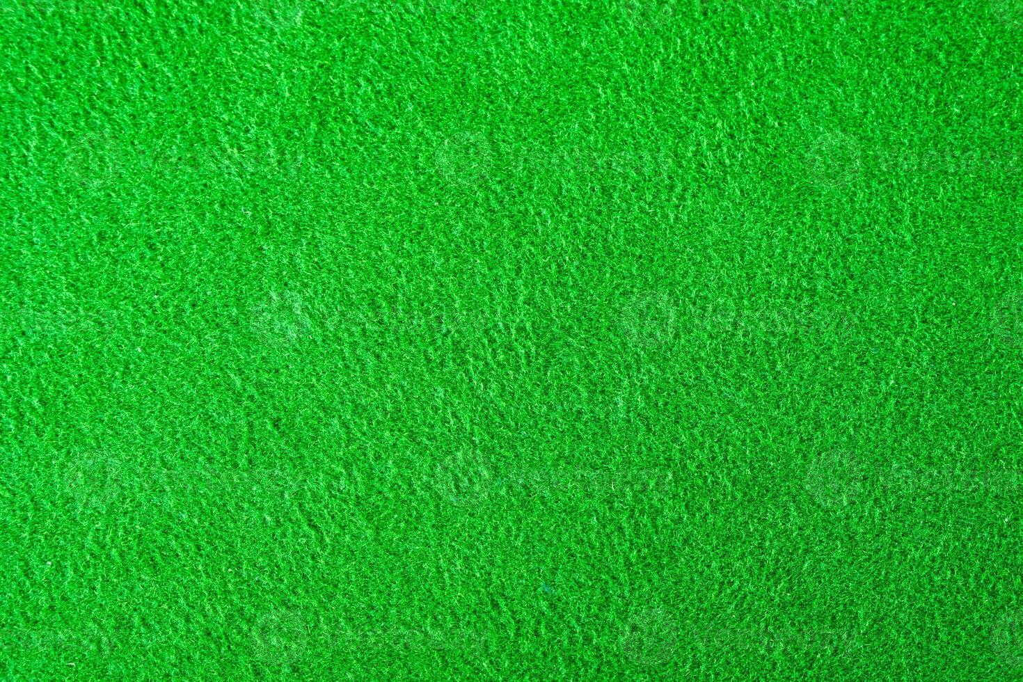 Green felt fabric texture for background photo