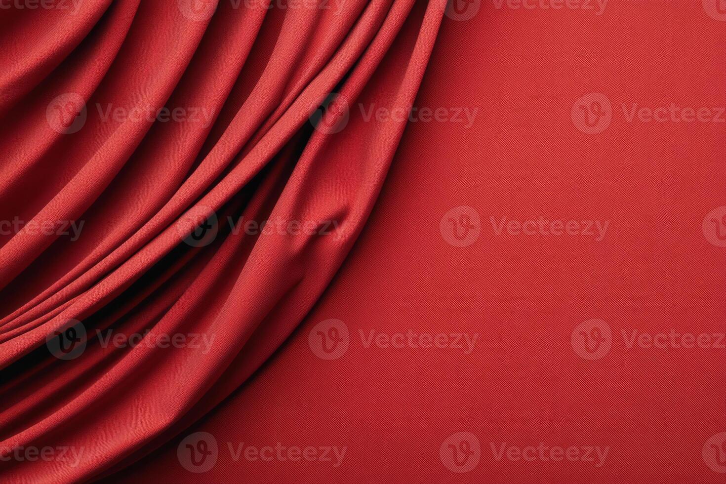 Red fabric with draping folds photo