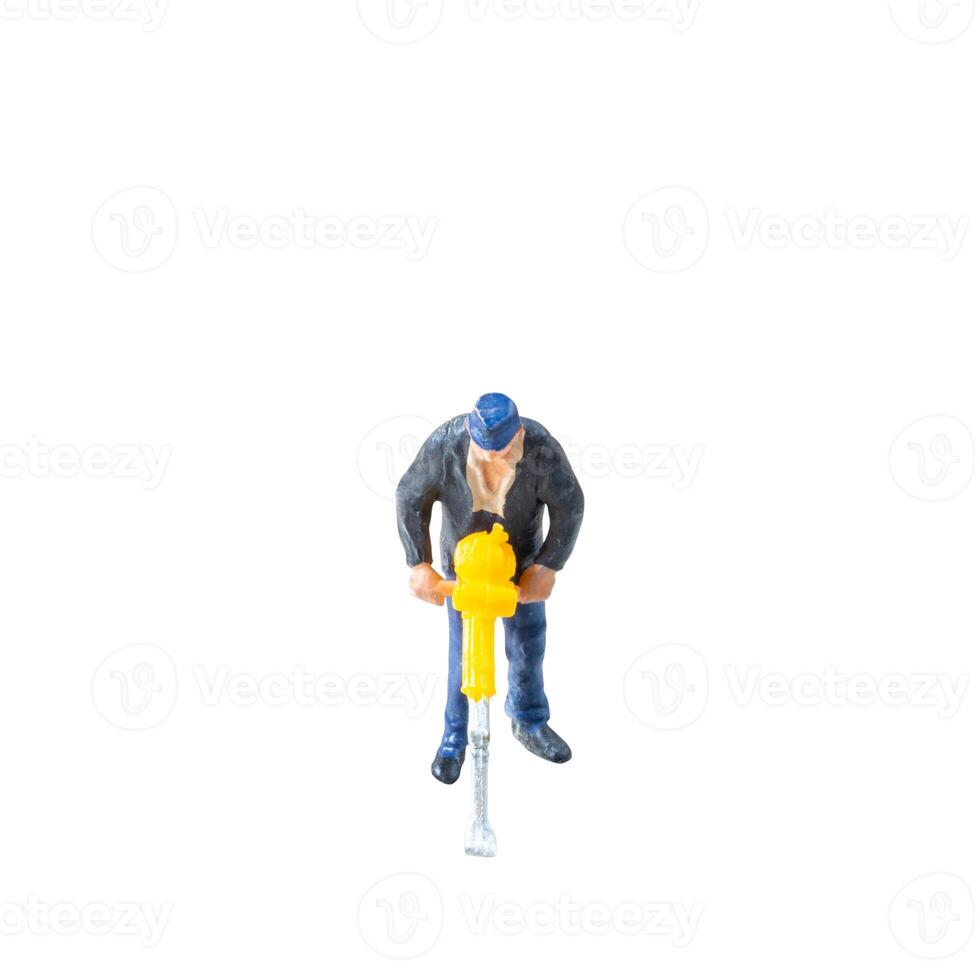 Miniature construction worker isolate on white background with clipping path photo