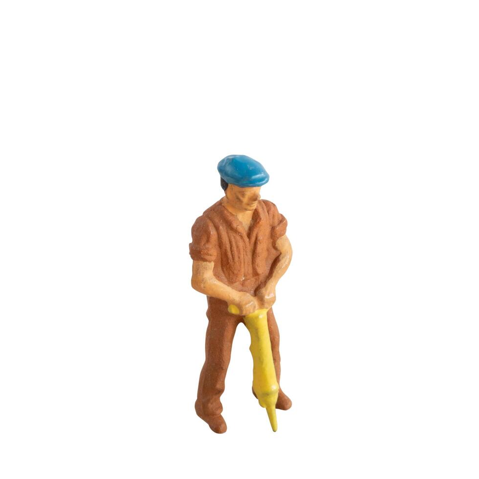 Miniature construction worker isolate on white background with clipping path photo
