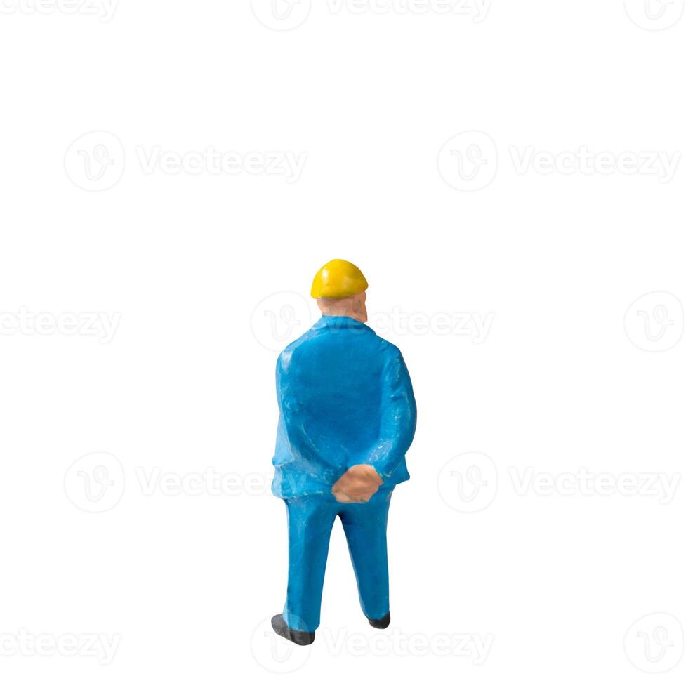 Miniature construction worker isolate on white background with clipping path photo