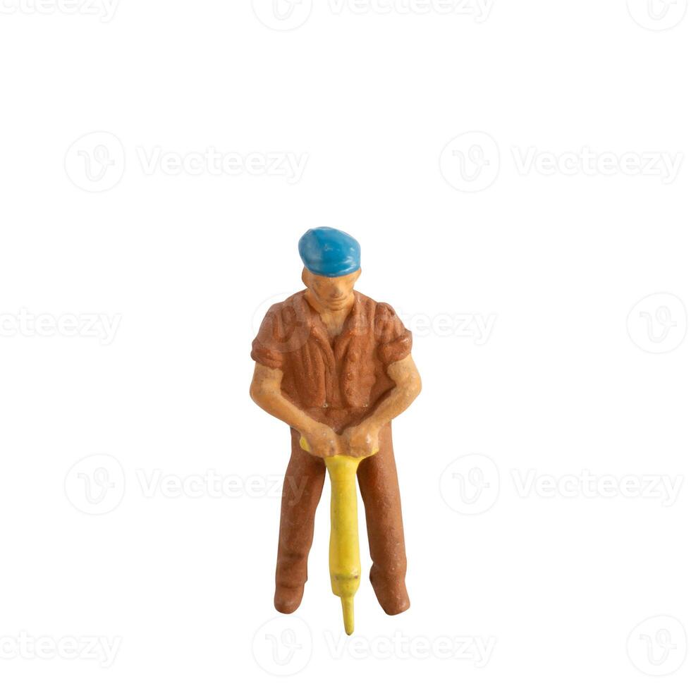 Miniature construction worker isolate on white background with clipping path photo