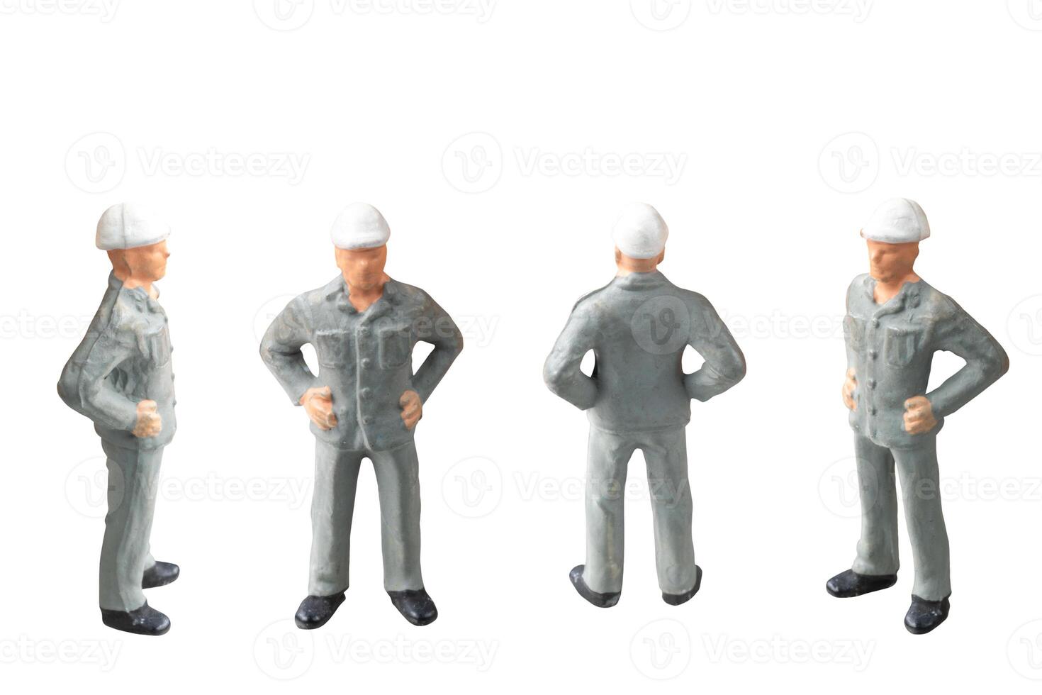 Miniature construction worker isolate on white background with clipping path photo