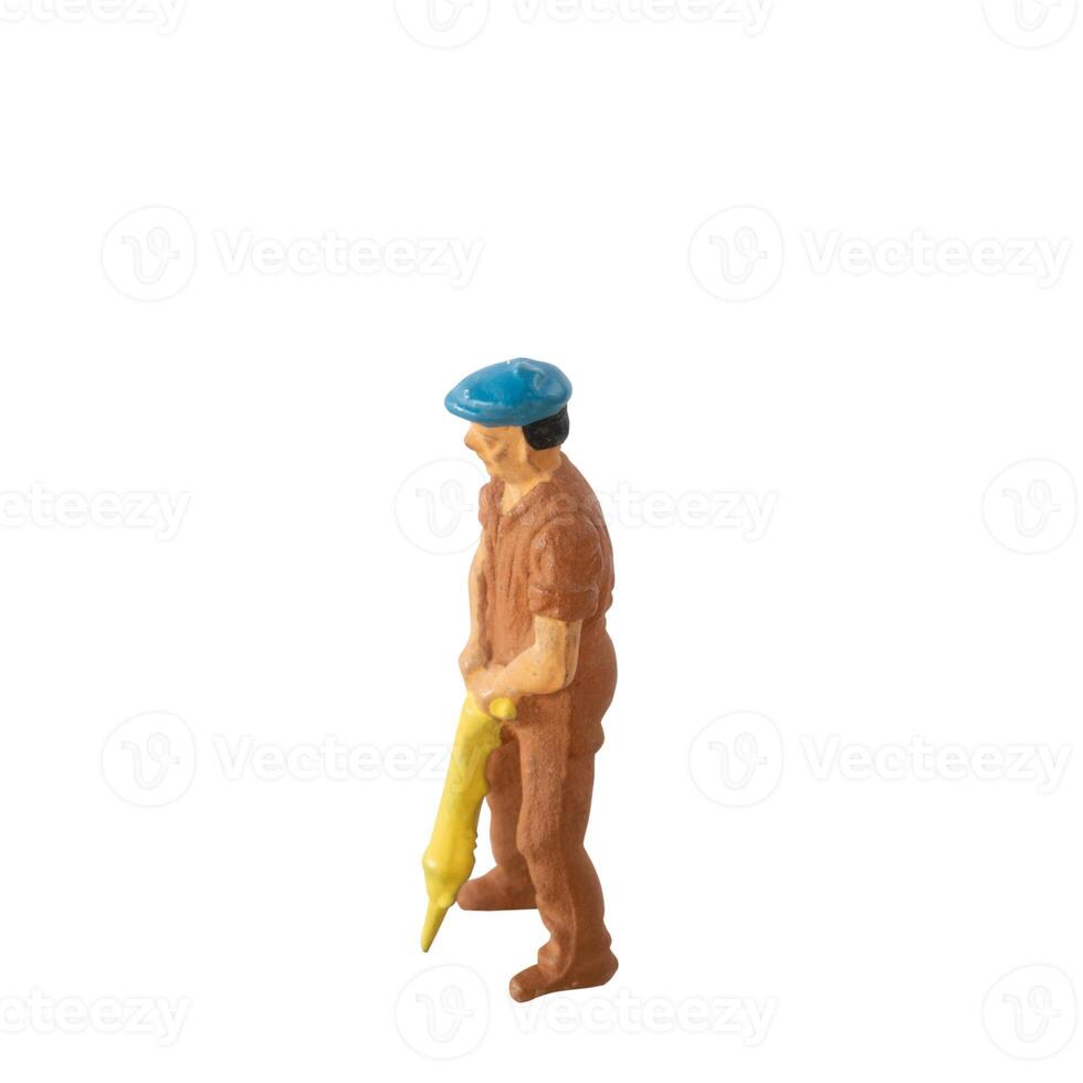 Miniature construction worker isolate on white background with clipping path photo