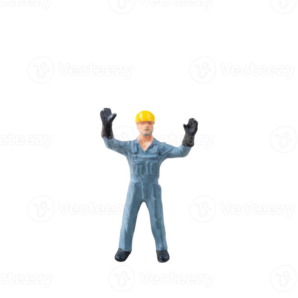 Miniature construction worker isolate on white background with clipping path photo