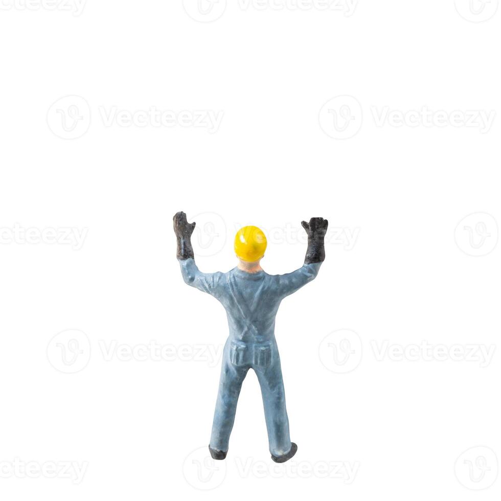 Miniature construction worker isolate on white background with clipping path photo