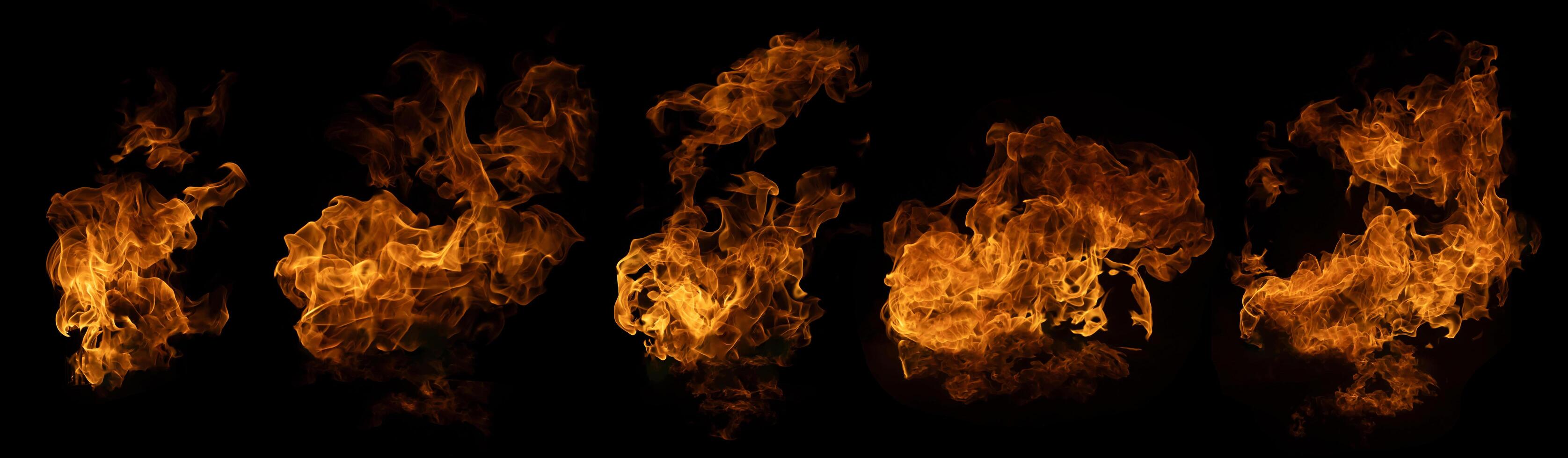 The set of fire and burning flame isolated on dark background for graphic design photo