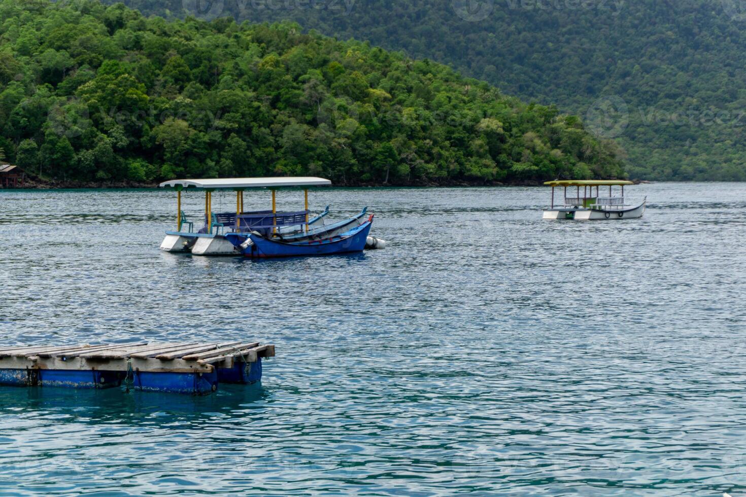 Beautiful landscape of Sabang island in Sumatera, Indonesia. Tour boat for tourist and divers at Sabang and Rubiah island. photo