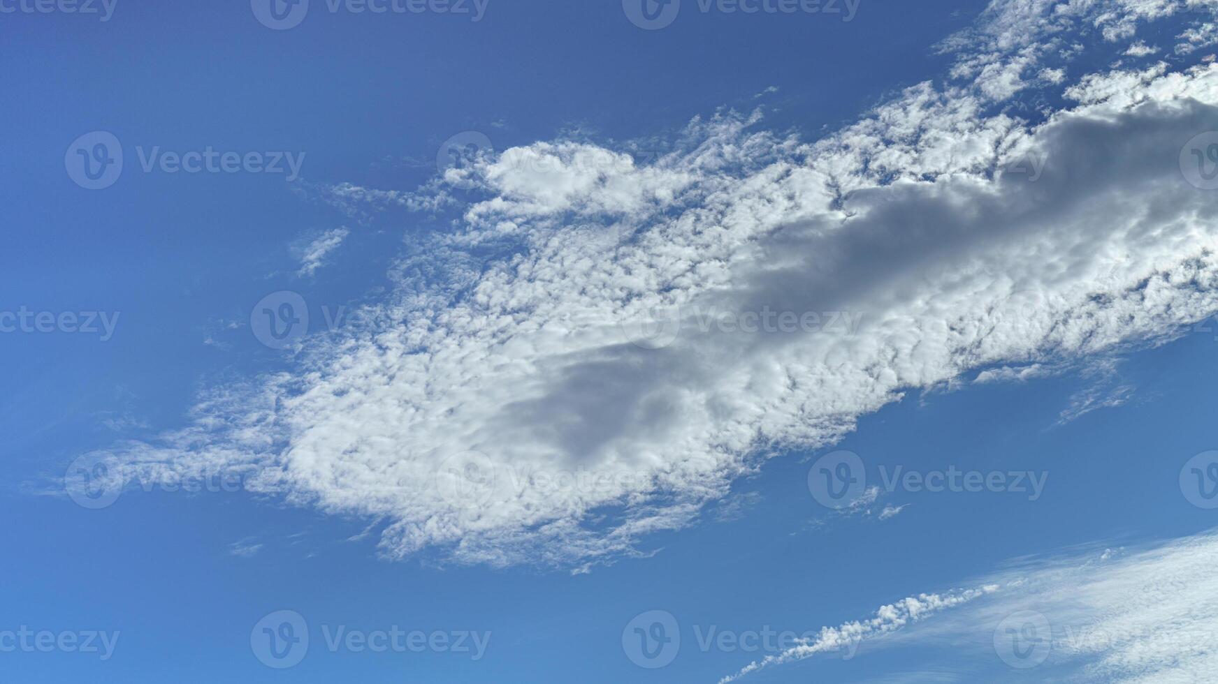 White clouds on the blue sky. photo