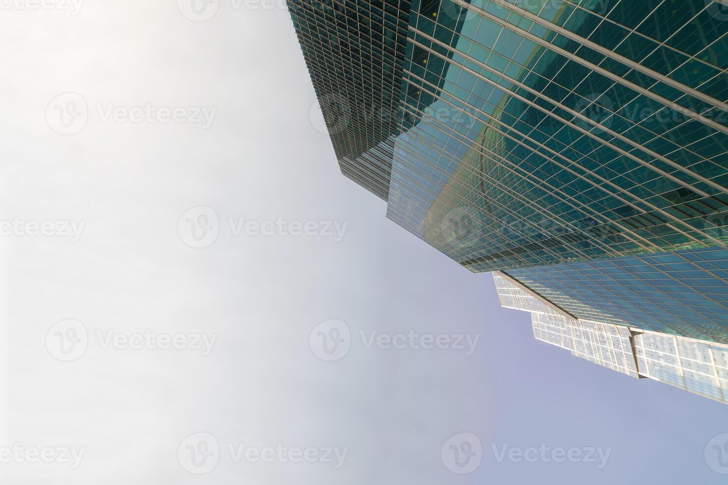 Modern skyscrapers - high-rise buildings in the down town. Bottom view. photo