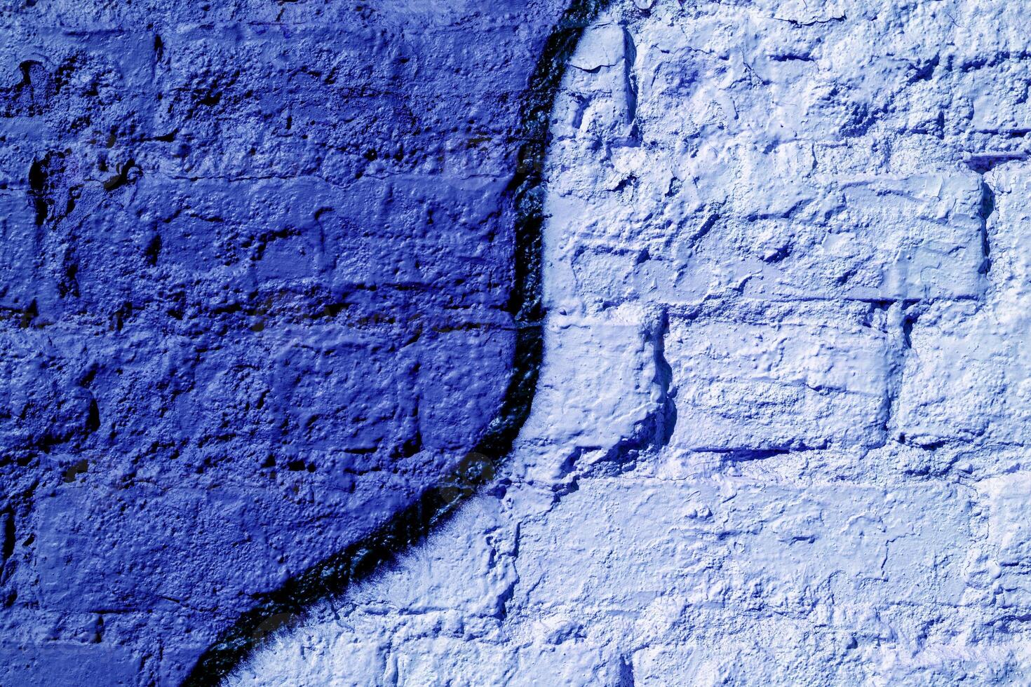 Brick wall painted blue. Background texture. photo