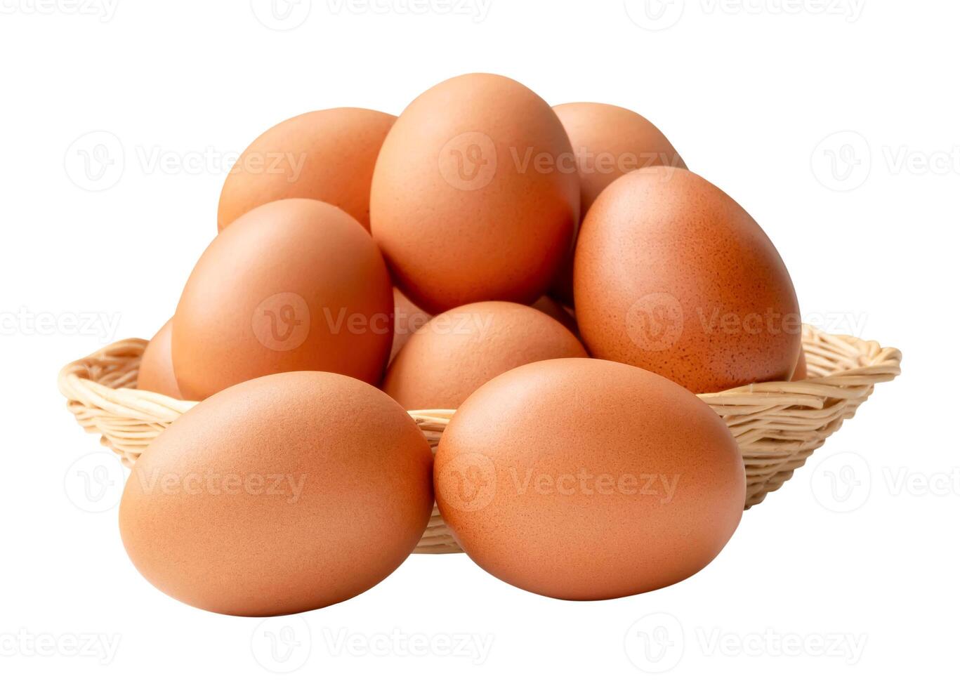 Group of fresh brown chicken eggs in stack in wicker basket isolated on white background with clipping path photo