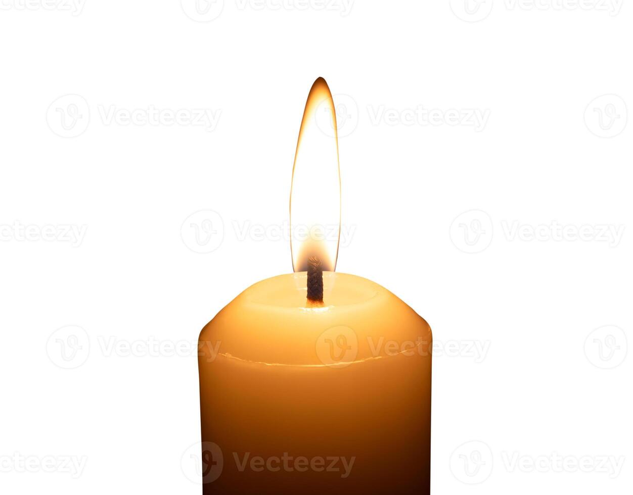 A single burning candle flame or light glowing on a big white candle isolated on white background with clipping path photo
