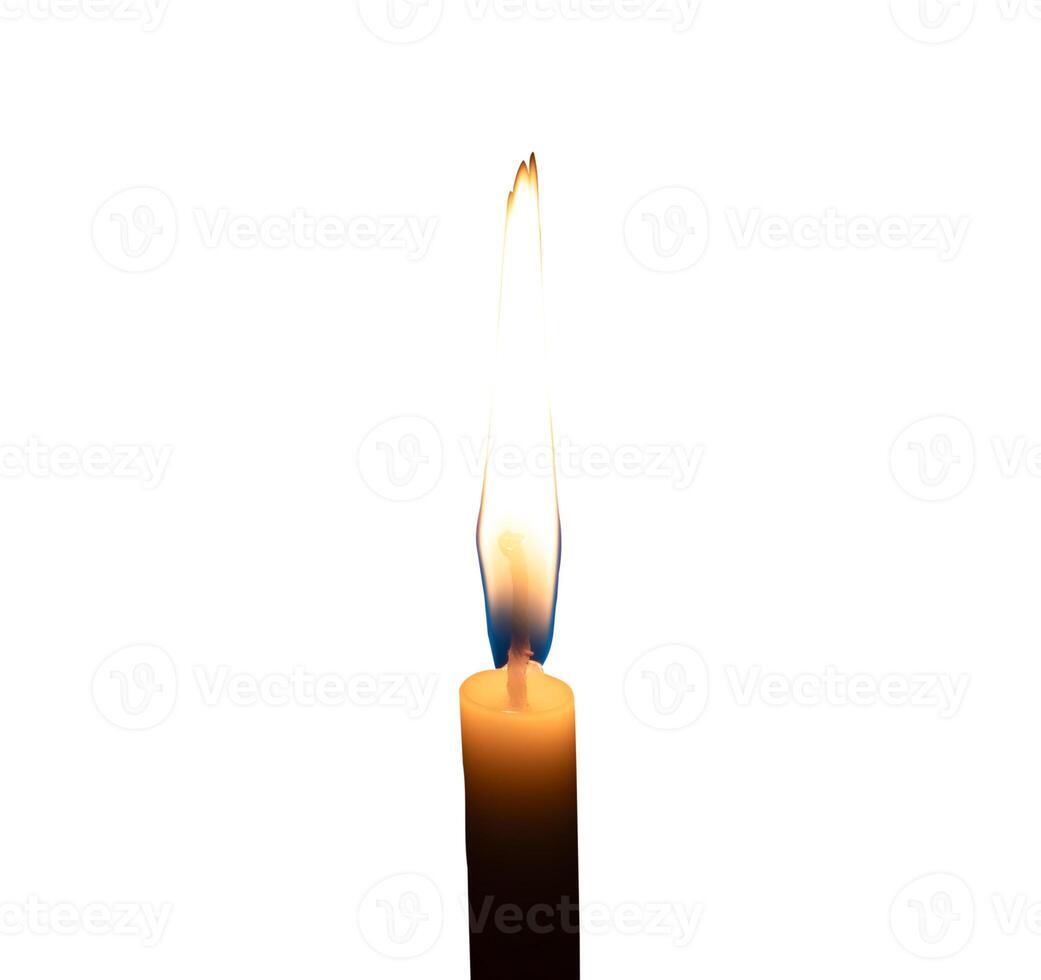 A single burning candle flame or light glowing on a small white candle isolated on white background with clipping path photo