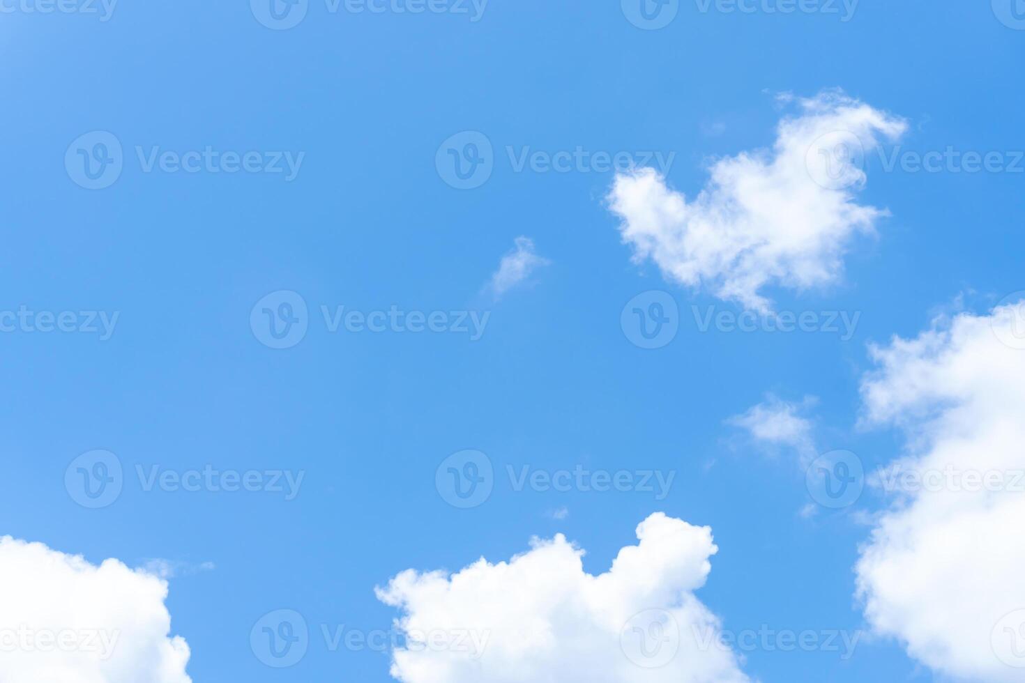 Low angle view of beautiful blue sky with strange shape of clouds in the morning or evening used as natural background texture in decorative art work photo
