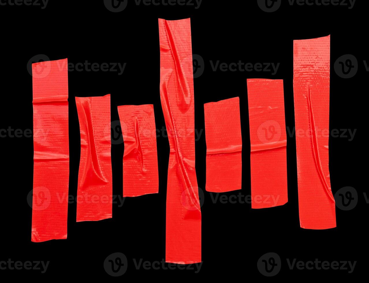 Top view set of wrinkled or crumpled red cloth tape or adhesive vinyl tape in stripes shape isolated on black background with clipping path photo