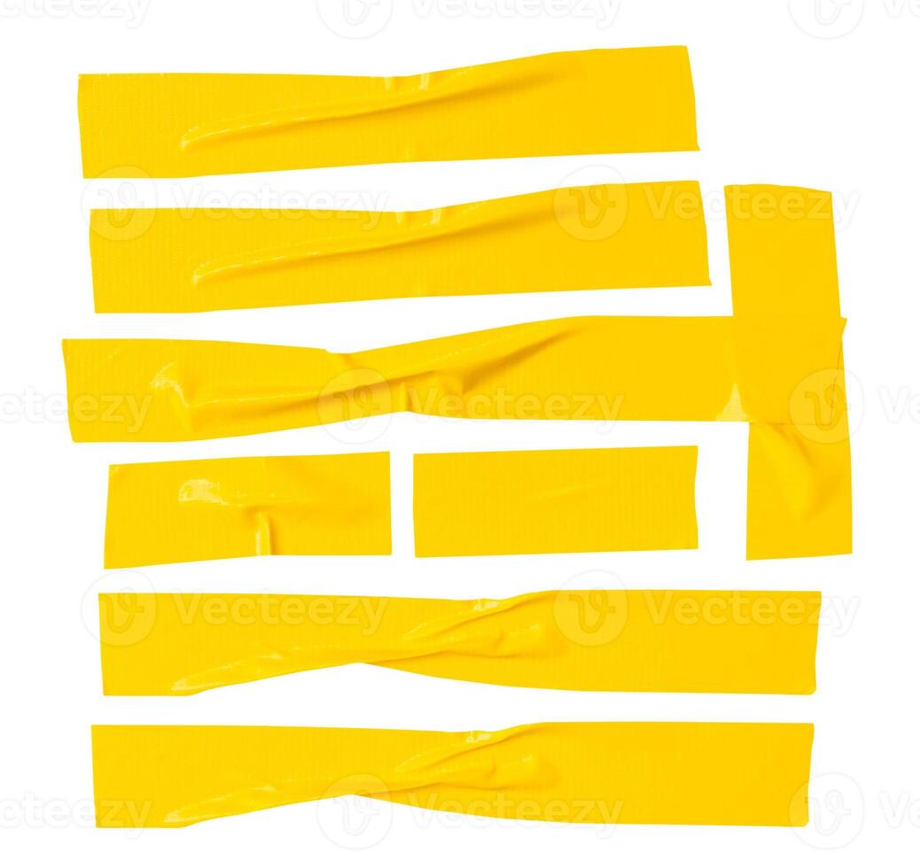 Top view set of wrinkled or crumpled yellow adhesive vinyl tape or cloth tape in stripes shape isolated on white background with clipping path photo